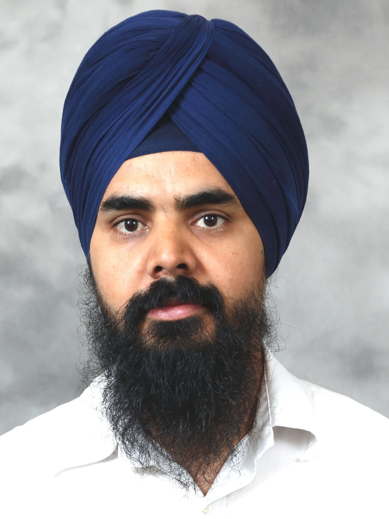 head shot of Harpreet Singh