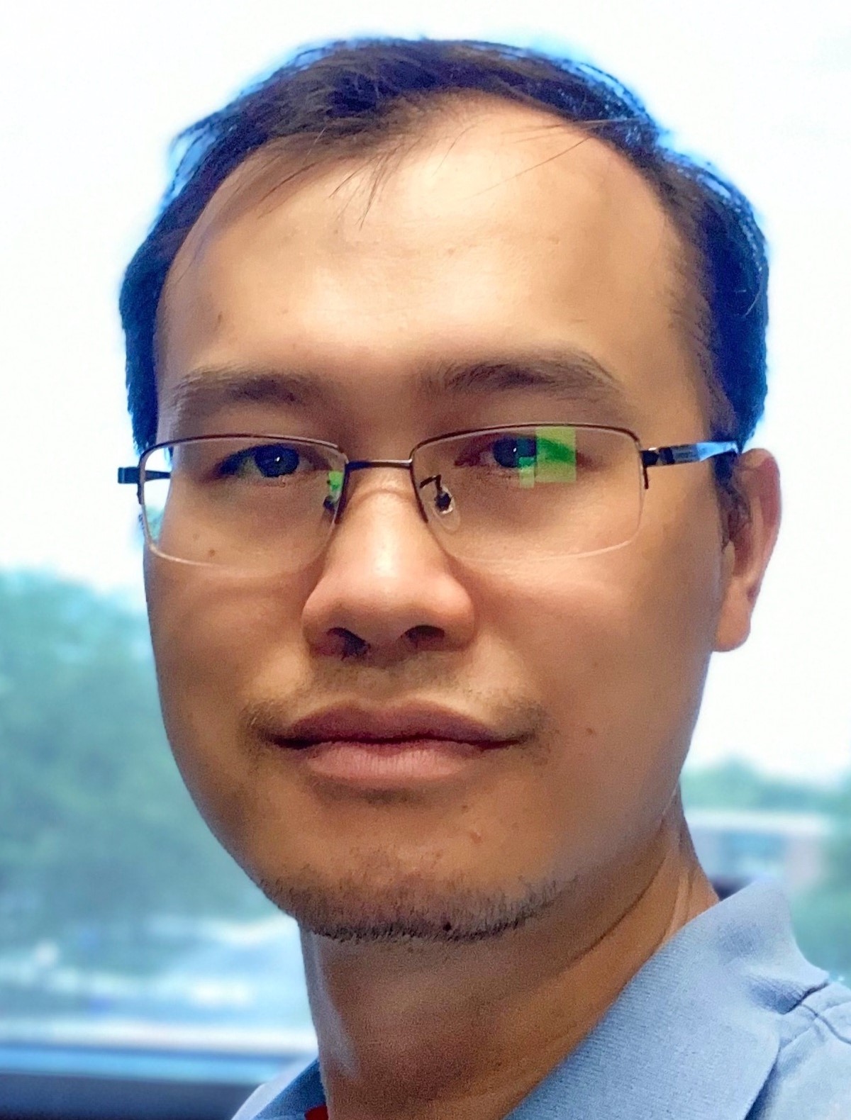 head shot of Kai Xu